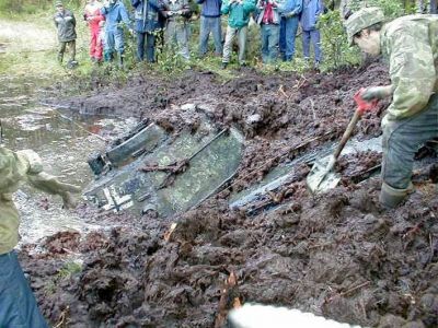 T34/76A recovered from an Estonian lake
T34/76A in German markings recovered (alledgedly in working order) from an Estonnian lake. Follow [url=http://www.englishrussia.com/?p=299]this link[/url] for the full story 
Keywords:  Russian German